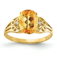 9-karatni prsten od žutog zlata s ovalnim citrinom i dijamantnim dijamantom.