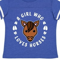 Preslatka djevojčica koja voli konje poklonit će majicu dječaku ili djevojčici