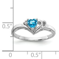 Karatni prsten od bijelog zlata s plavim topazom i dijamantnim srcem